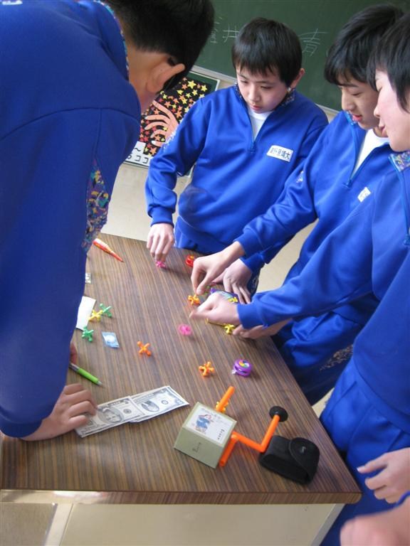 Students Playing Jacks