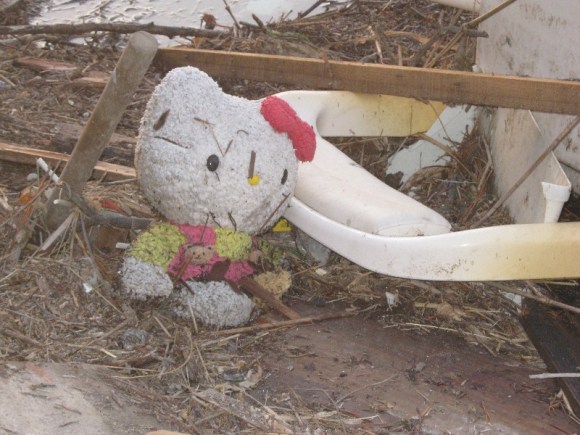 Child's toy in debris