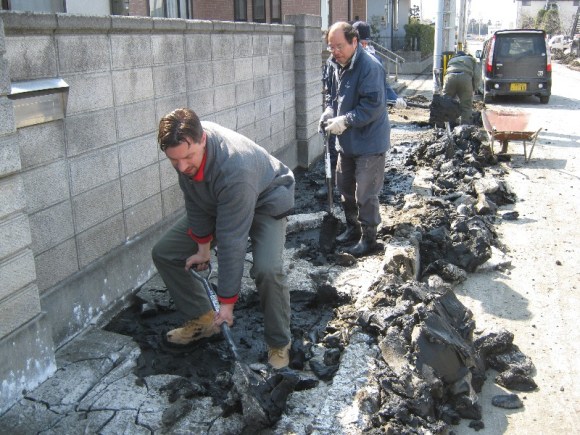 Shovelling tsunami muck